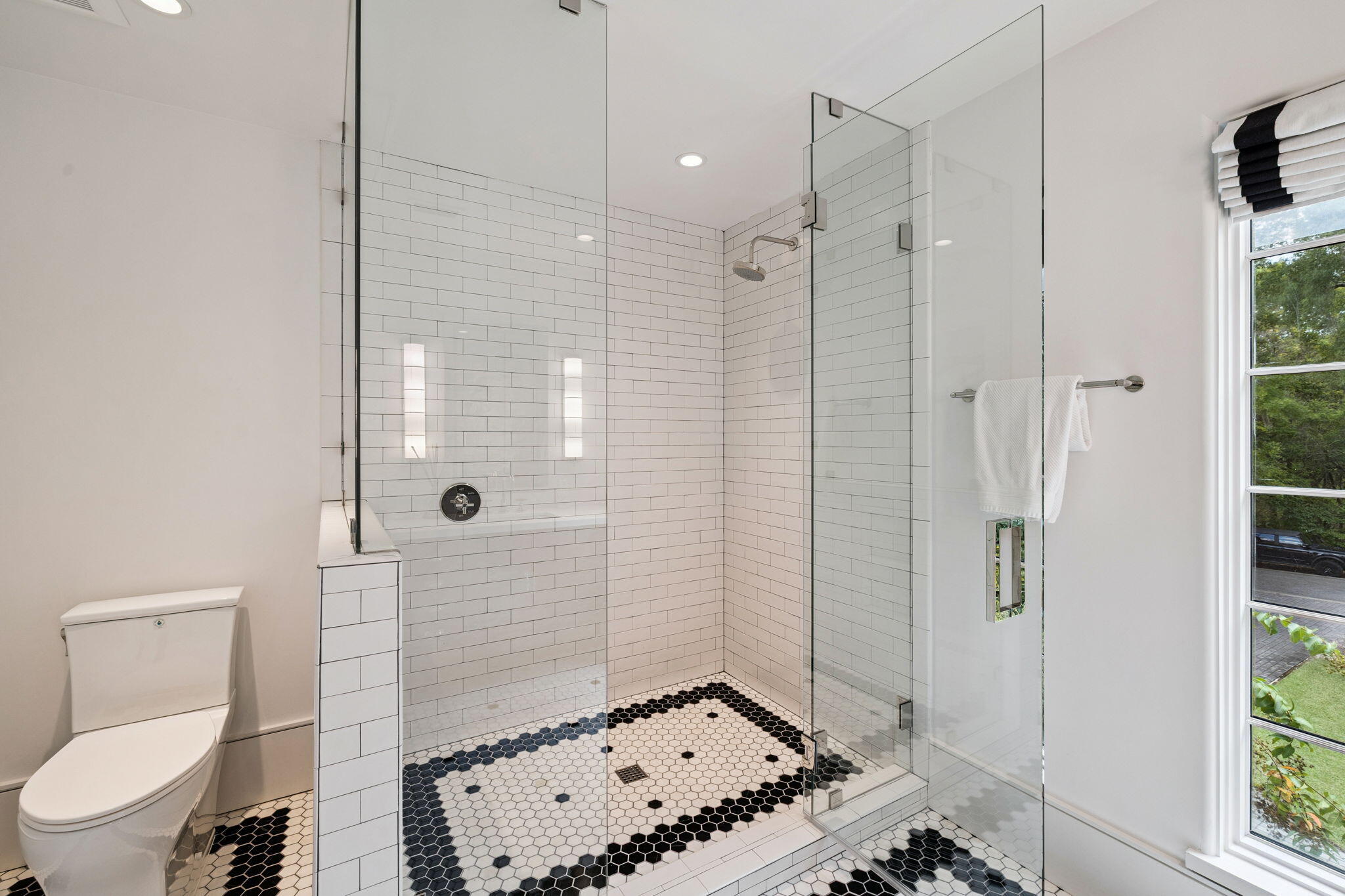 147 Ansley Forest Drive Santa Rosa Beach, FL 32459 - Photo 22 of 48 a bathroom with a toilet and shower