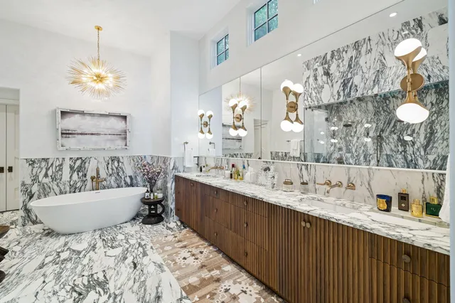 a bathroom with a sink double vanity and a mirror