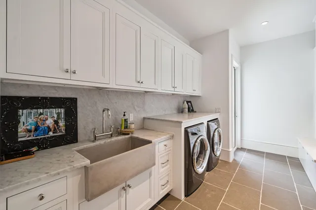 a kitchen with cabinets and a stove top oven