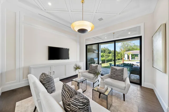 a view of a kitchen with a sink and refrigerator