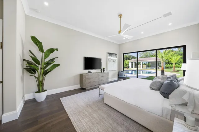 a view of a swimming pool with a yard