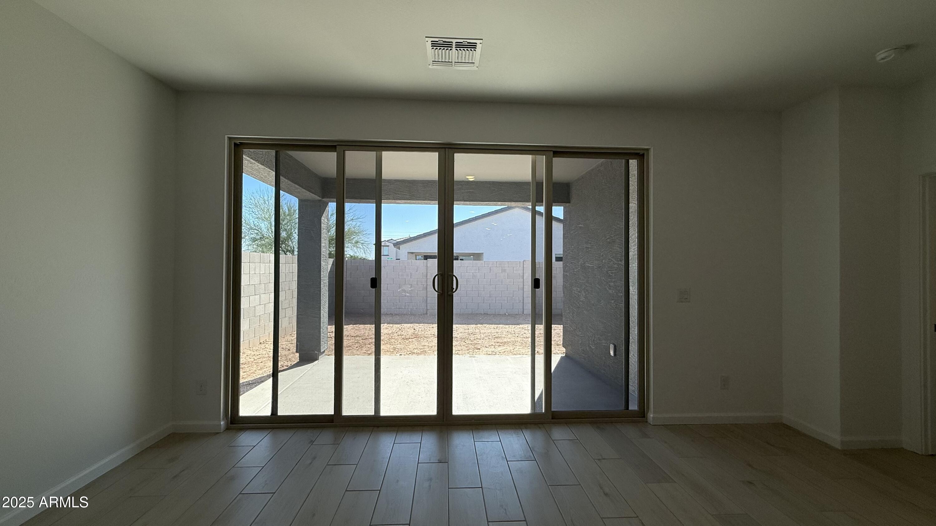 46819 West Old Timer Road Maricopa, AZ 85139 - Photo 28 of 44 a view of entryway with wooden floor