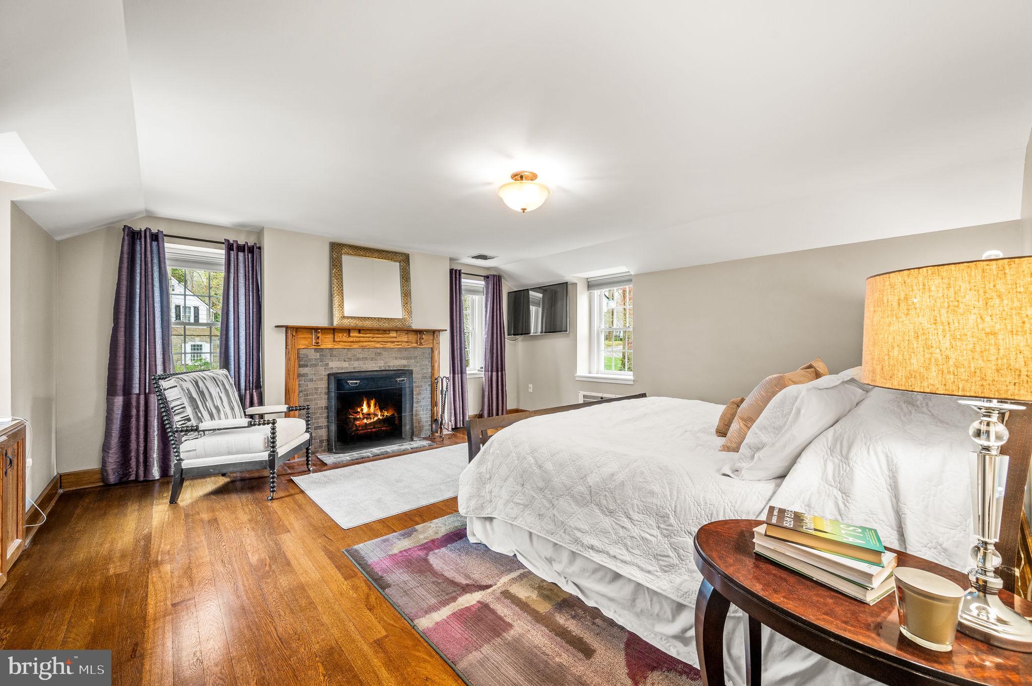 304 Keithwood Road Wynnewood, PA 19096 - Photo 39 of 78 Primary bedroom with fireplace