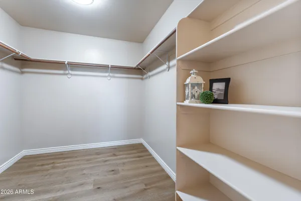 a view of an empty walk in closet