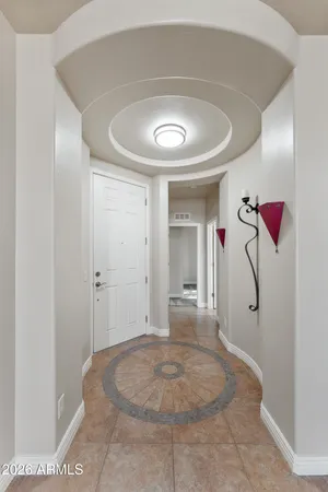 a view of a hallway with a bathroom