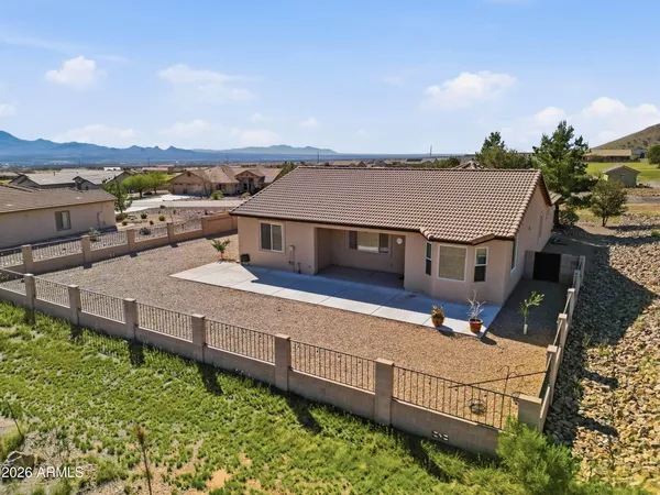 a view of a terrace with wooden floor and a terrace view