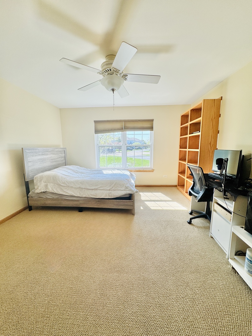 19245 Tramore Lane Mokena, IL 60448 - Photo 11 of 21 a bedroom with a bed and a desk