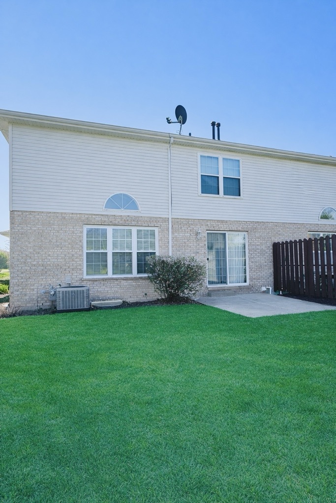 19245 Tramore Lane Mokena, IL 60448 - Photo 21 of 21 a front view of a house with garden