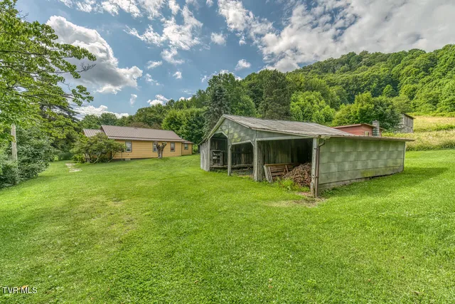 $325,000 | 427 Cove Creek Road, Roan Mountain, TN 37687