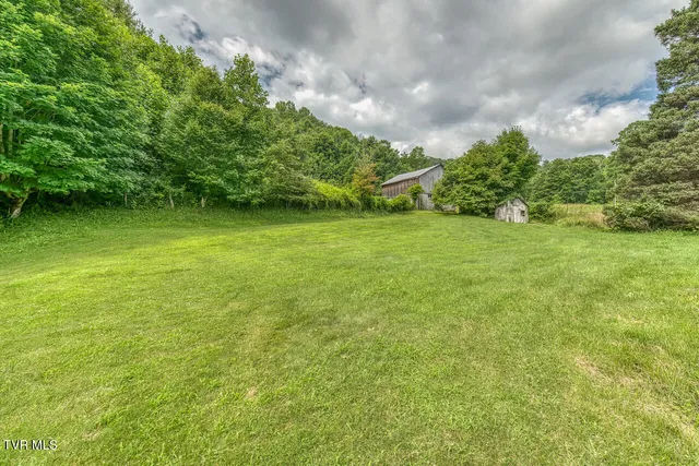 $325,000 | 427 Cove Creek Road, Roan Mountain, TN 37687