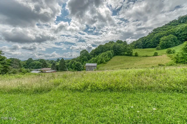 $325,000 | 427 Cove Creek Road, Roan Mountain, TN 37687
