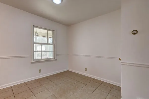 a view of a room that has a window in it