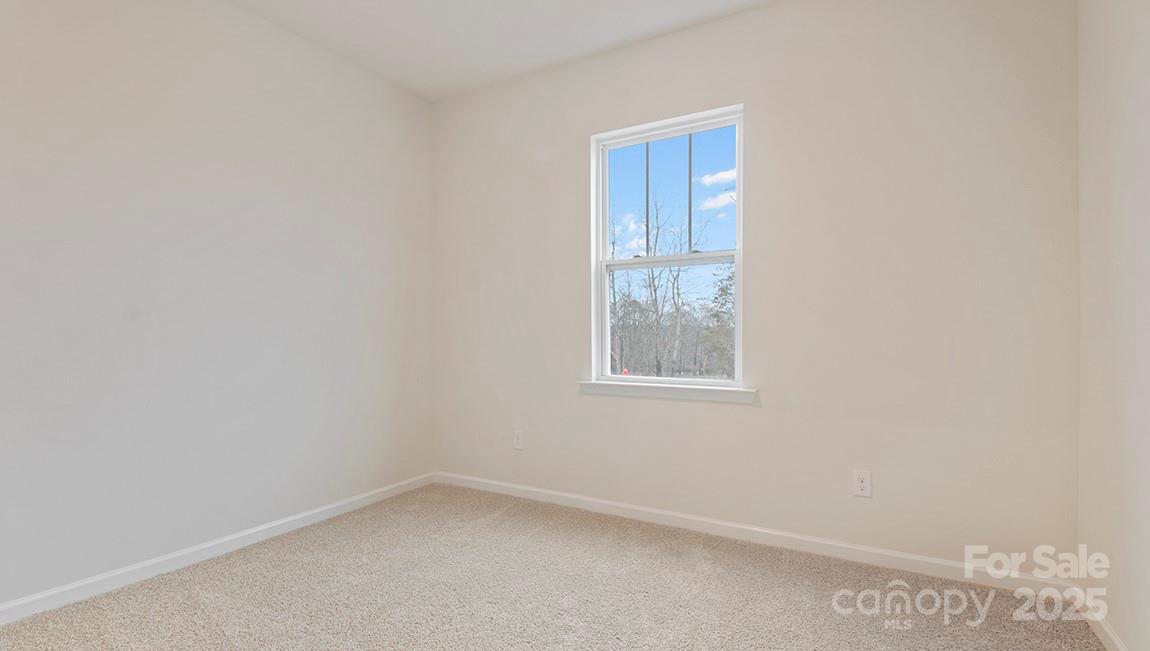 15 Shorthorn Road Fletcher, NC 28732 - Photo 23 of 34 a view of an empty room with a window