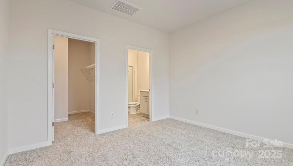 15 Shorthorn Road Fletcher, NC 28732 - Photo 26 of 34 an empty room with closet area