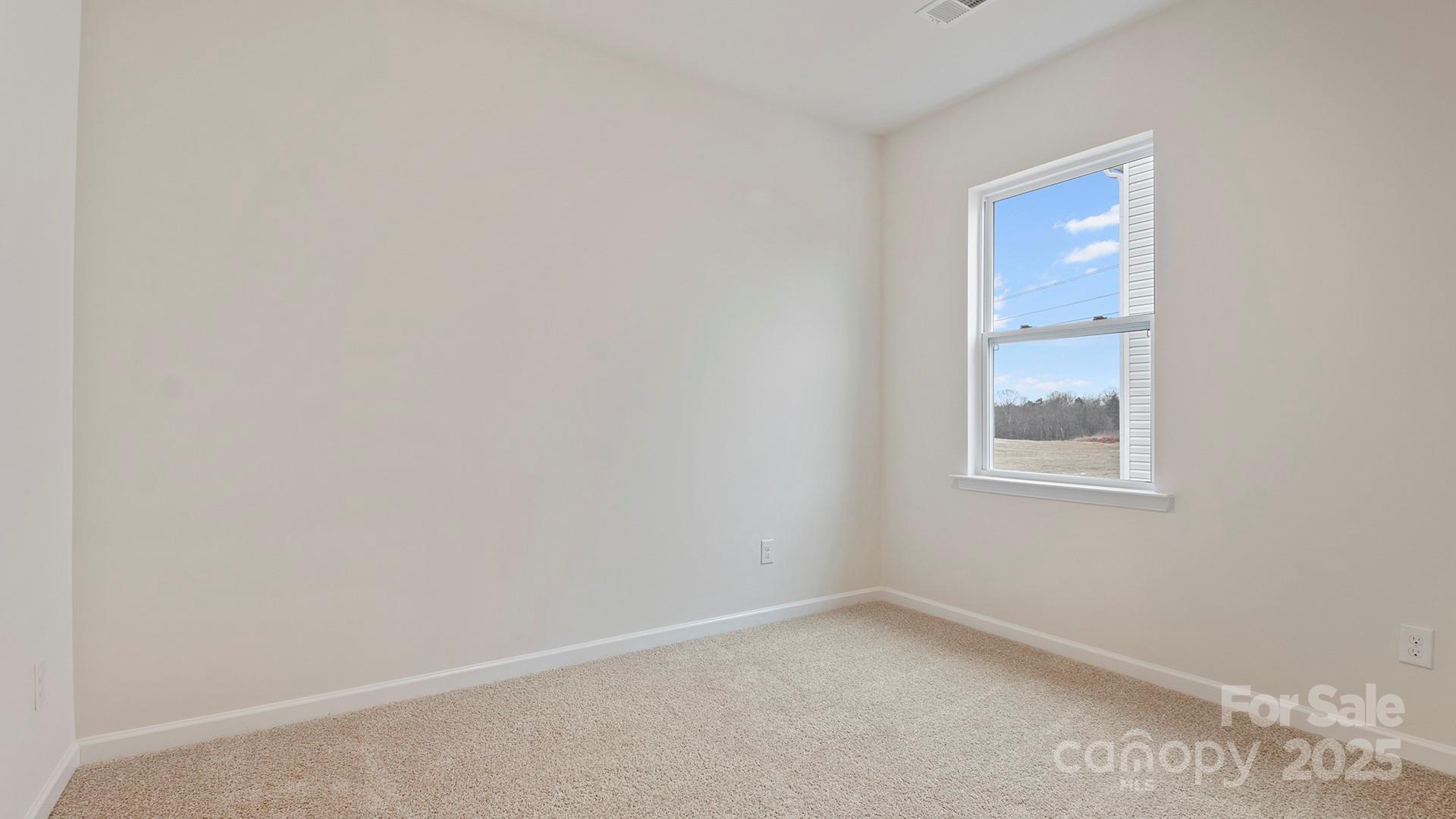 15 Shorthorn Road Fletcher, NC 28732 - Photo 29 of 34 a room that has a window in it