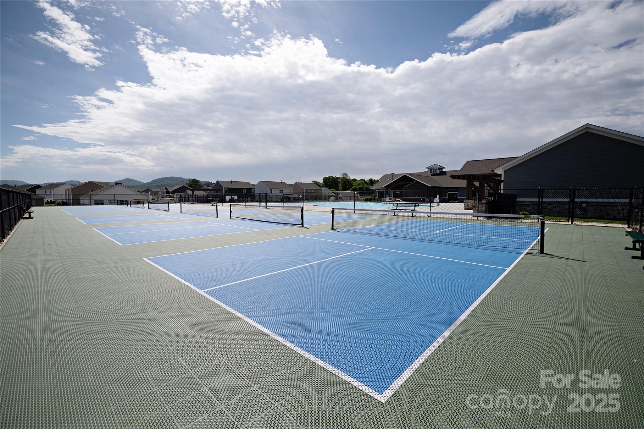 15 Shorthorn Road Fletcher, NC 28732 - Photo 34 of 34 a view of tennis court with houses