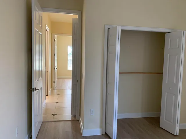 a view of a bathroom with a glass shower door