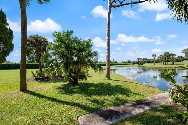a view of a lake in front of the house