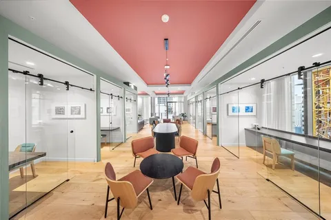 a view of a city with tall buildings