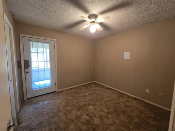 a view of a yard with an trees