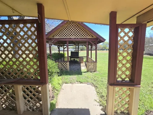a view of empty room with windows