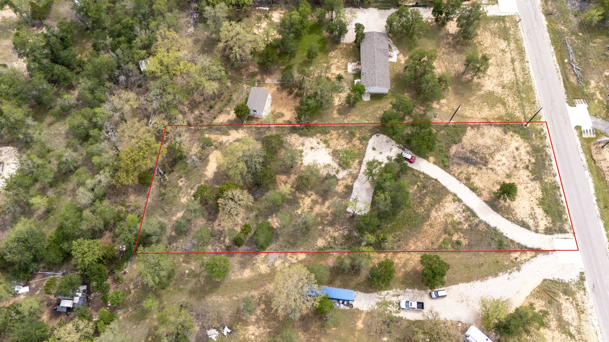 171 Comancheria Trail Elgin, TX 78621 - Photo 5 of 24 Aerial overview of property's location with property parcel outlined