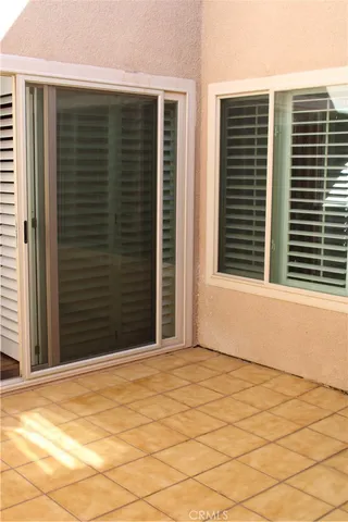a view of a potted plant in front of a door