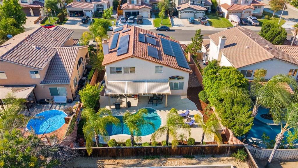 20885 Bakal Drive Riverside, CA 92508 - Photo 4 of 47 an aerial view of a house with a yard and large trees
