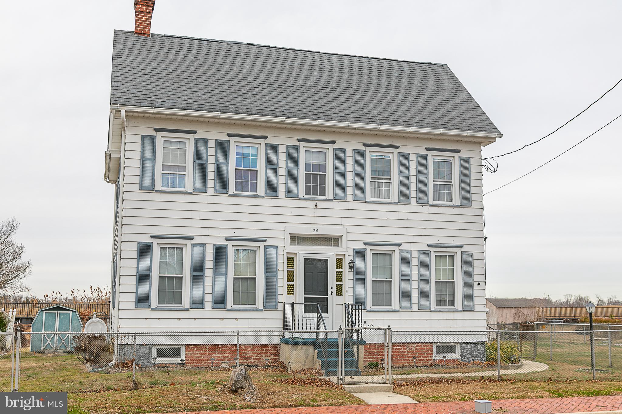 24 Front Street Hancocks Bridge, NJ 08038 - Photo 3 of 8 a front view of a house
