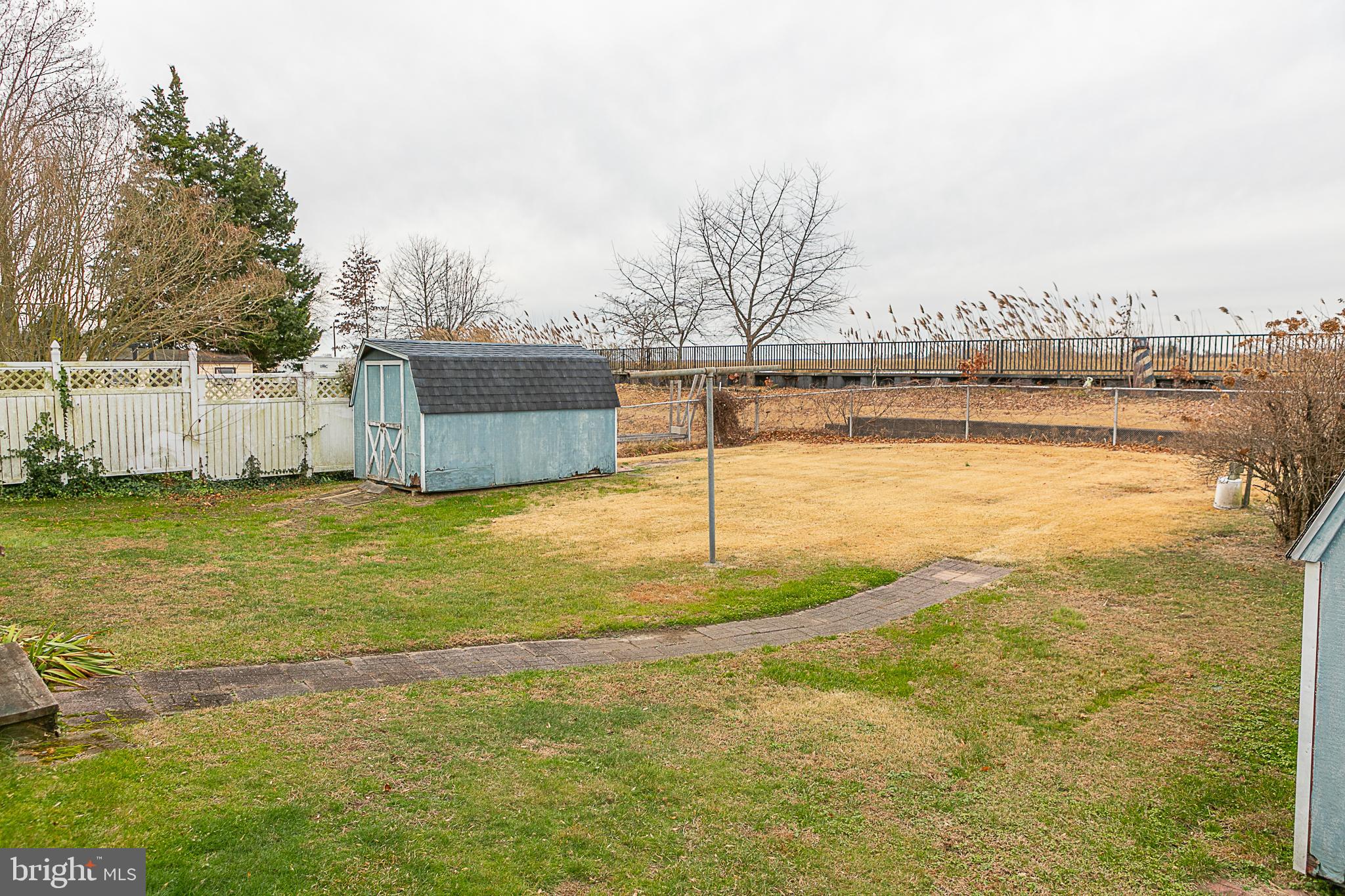 24 Front Street Hancocks Bridge, NJ 08038 - Photo 4 of 8 a view of a swimming pool with an ocean view