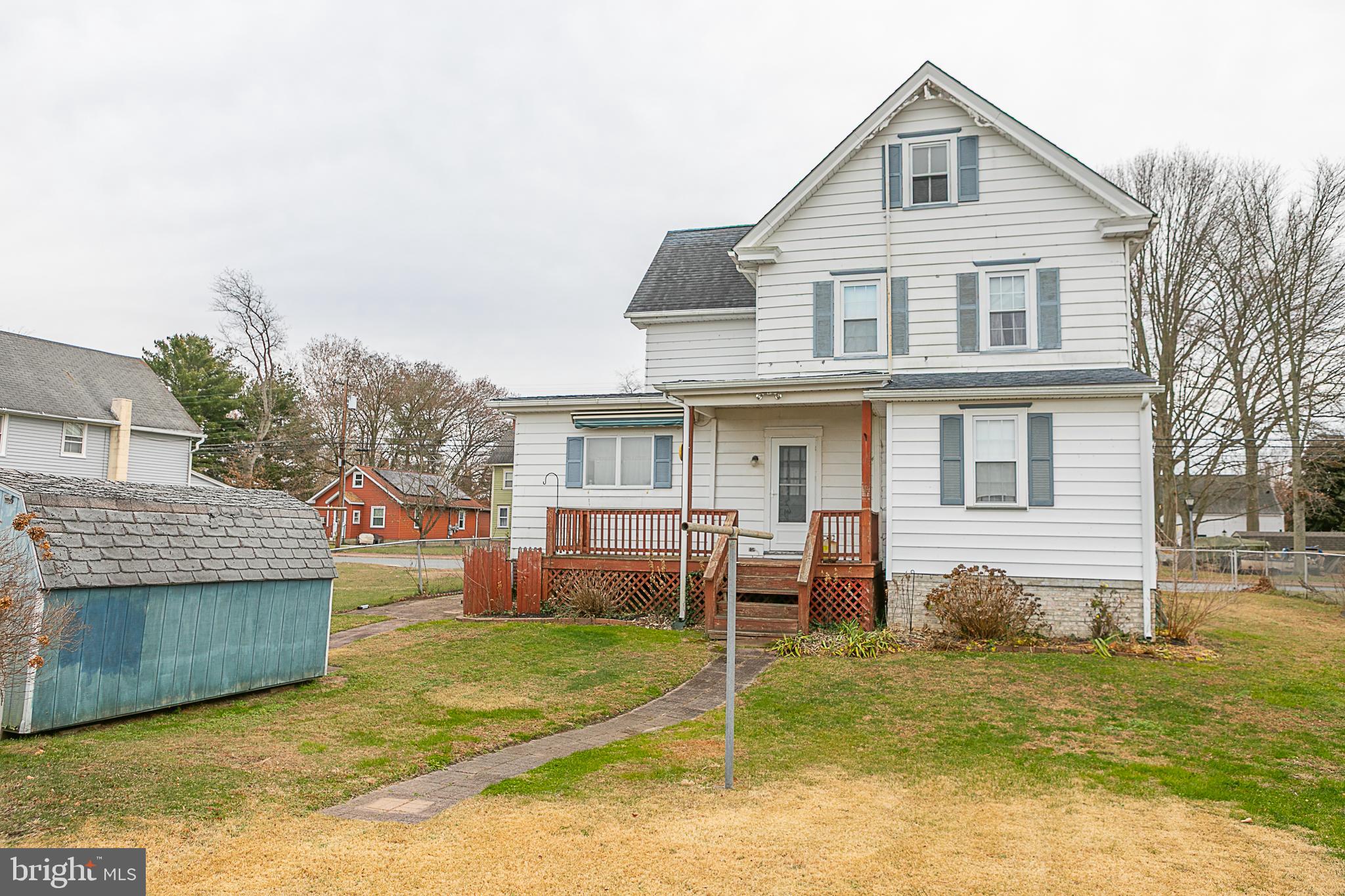 24 Front Street Hancocks Bridge, NJ 08038 - Photo 5 of 8 a front view of a house with a yard