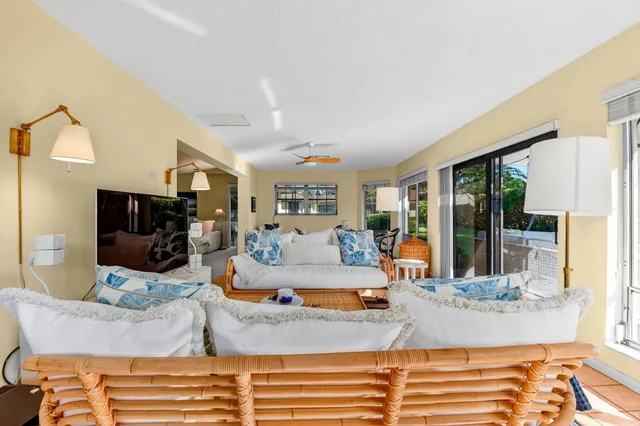 a view of living room with furniture and flat screen tv