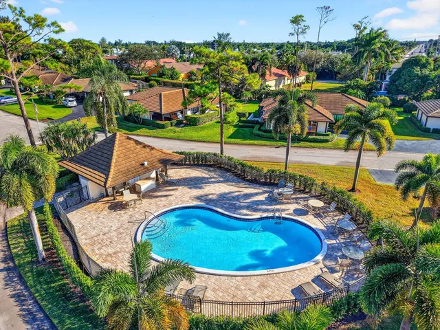 $550,000 | 440 Pine Villa Drive, Atlantis, FL 33462