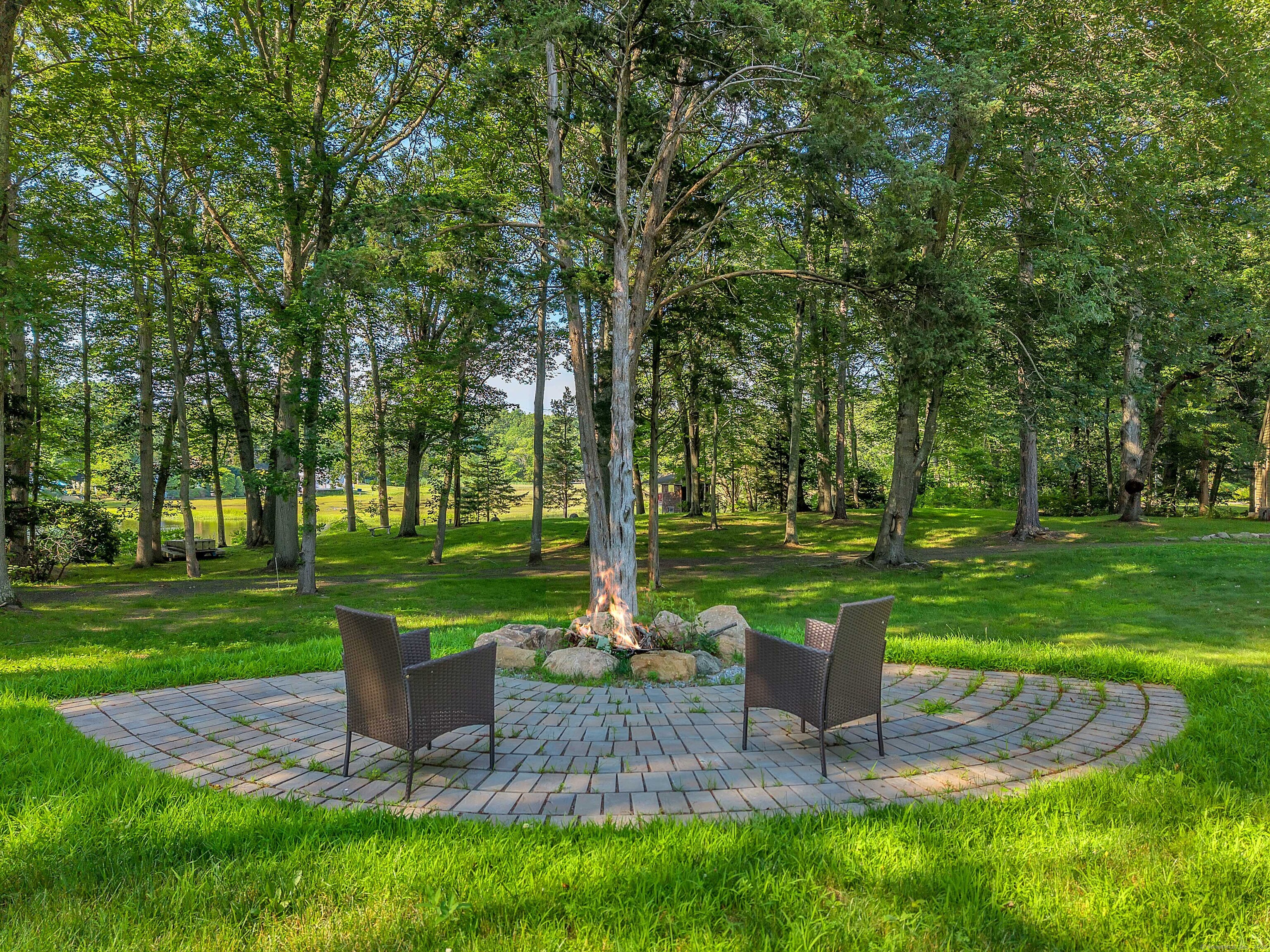 448 Grove Beach Road North Westbrook, CT 06498 - Photo 14 of 40 a view of a park with sitting area