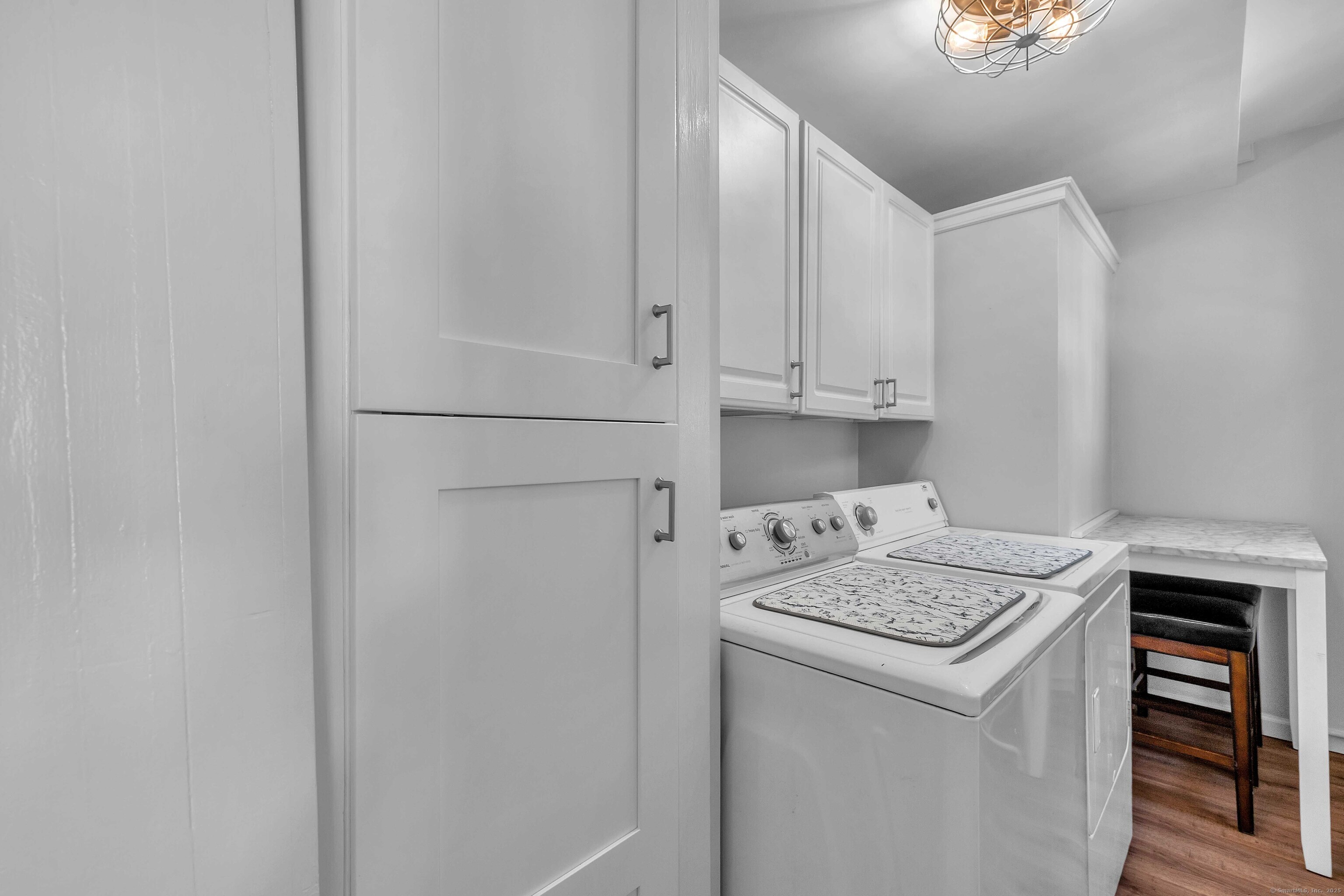 448 Grove Beach Road North Westbrook, CT 06498 - Photo 20 of 40 a utility room with washer and dryer