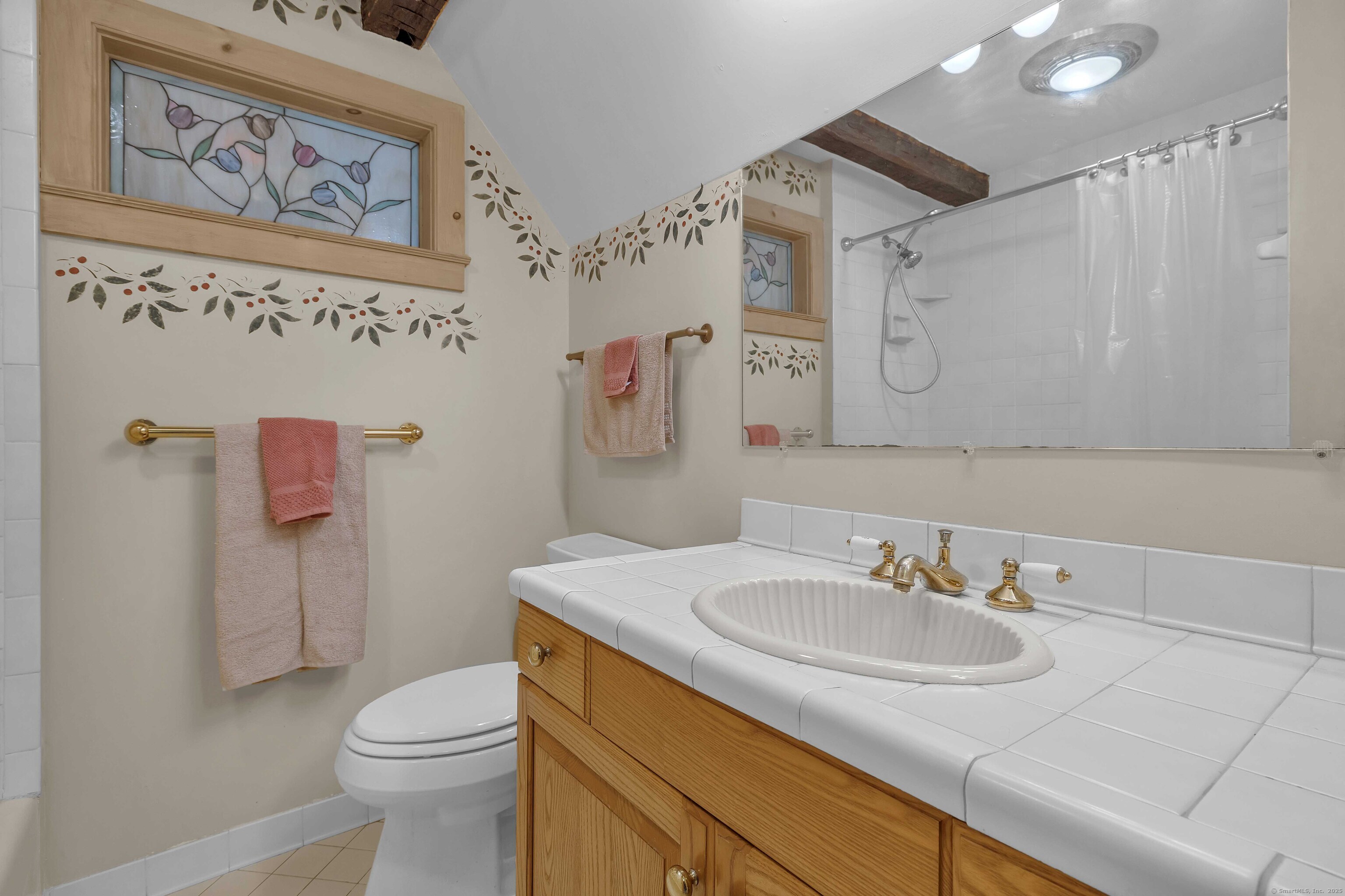 448 Grove Beach Road North Westbrook, CT 06498 - Photo 29 of 40 a bathroom with a sink and a toilet