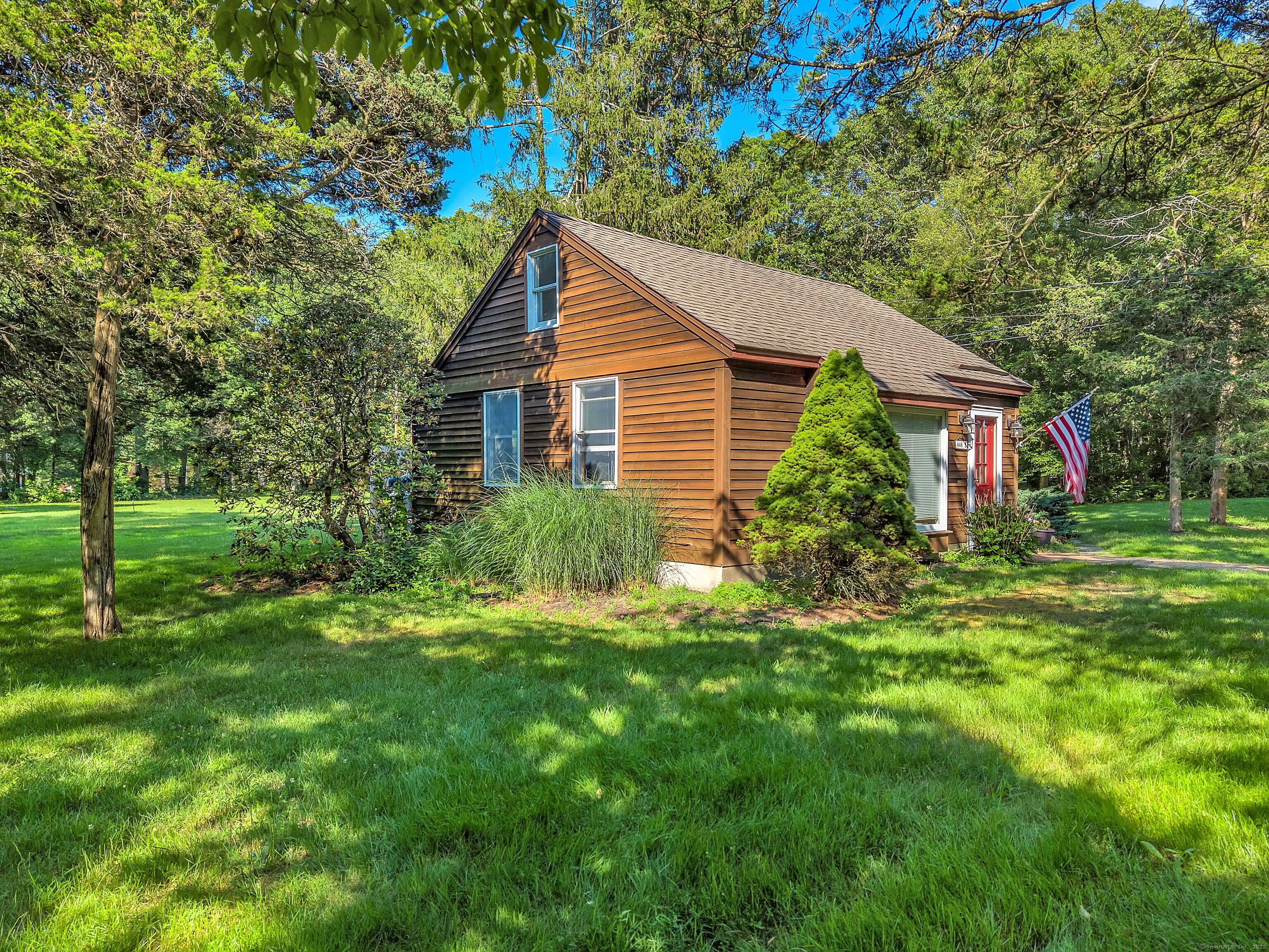 448 Grove Beach Road North Westbrook, CT 06498 - Photo 34 of 40 a house that has a tree in it