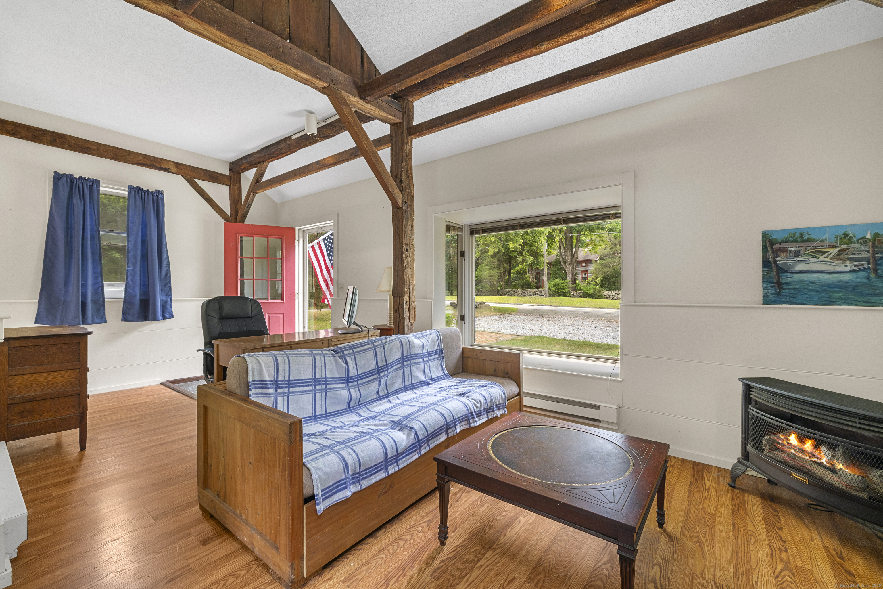 448 Grove Beach Road North Westbrook, CT 06498 - Photo 36 of 40 a living room with furniture and a window