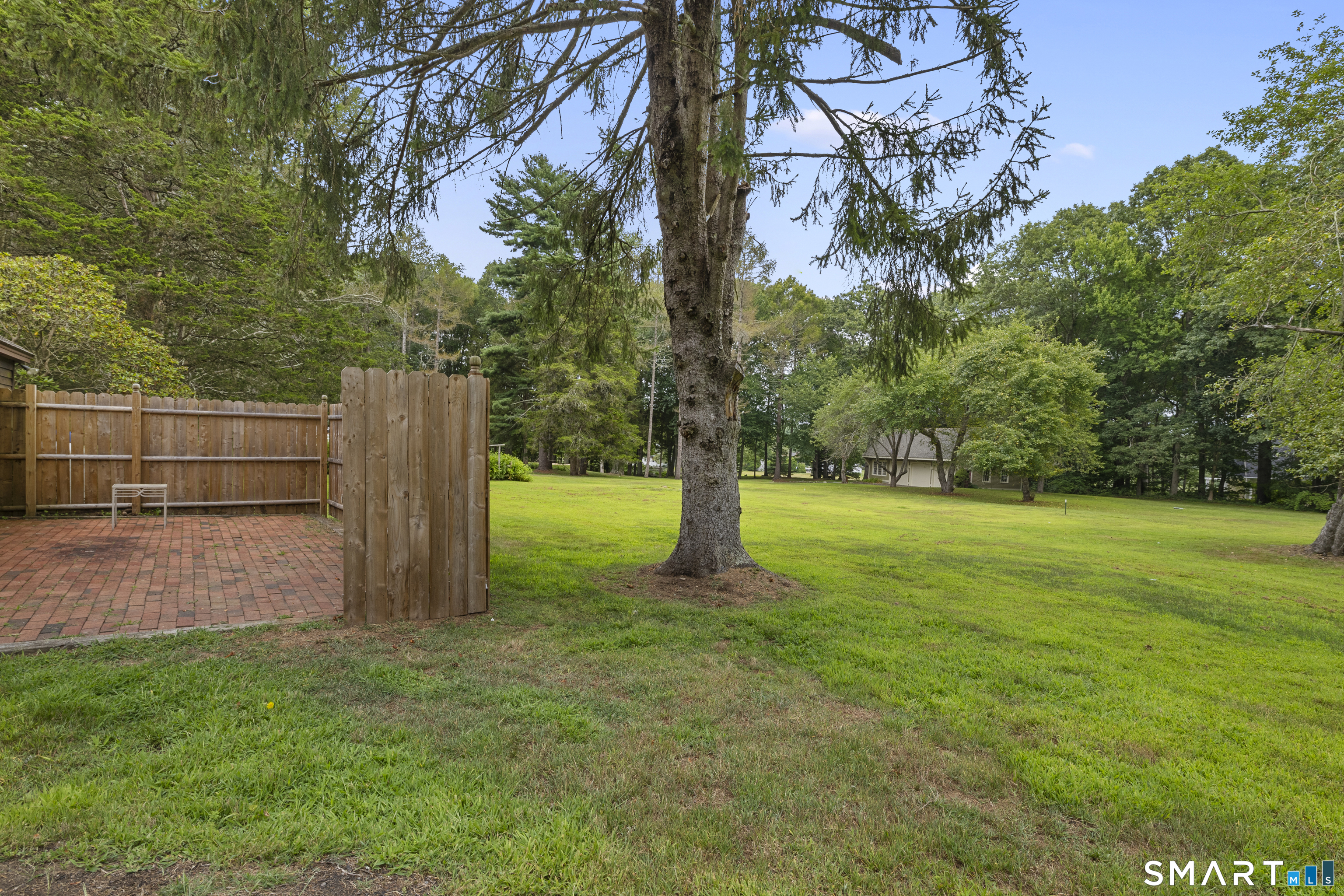448 Grove Beach Road North Westbrook, CT 06498 - Photo 40 of 40 a view of a yard with a tree