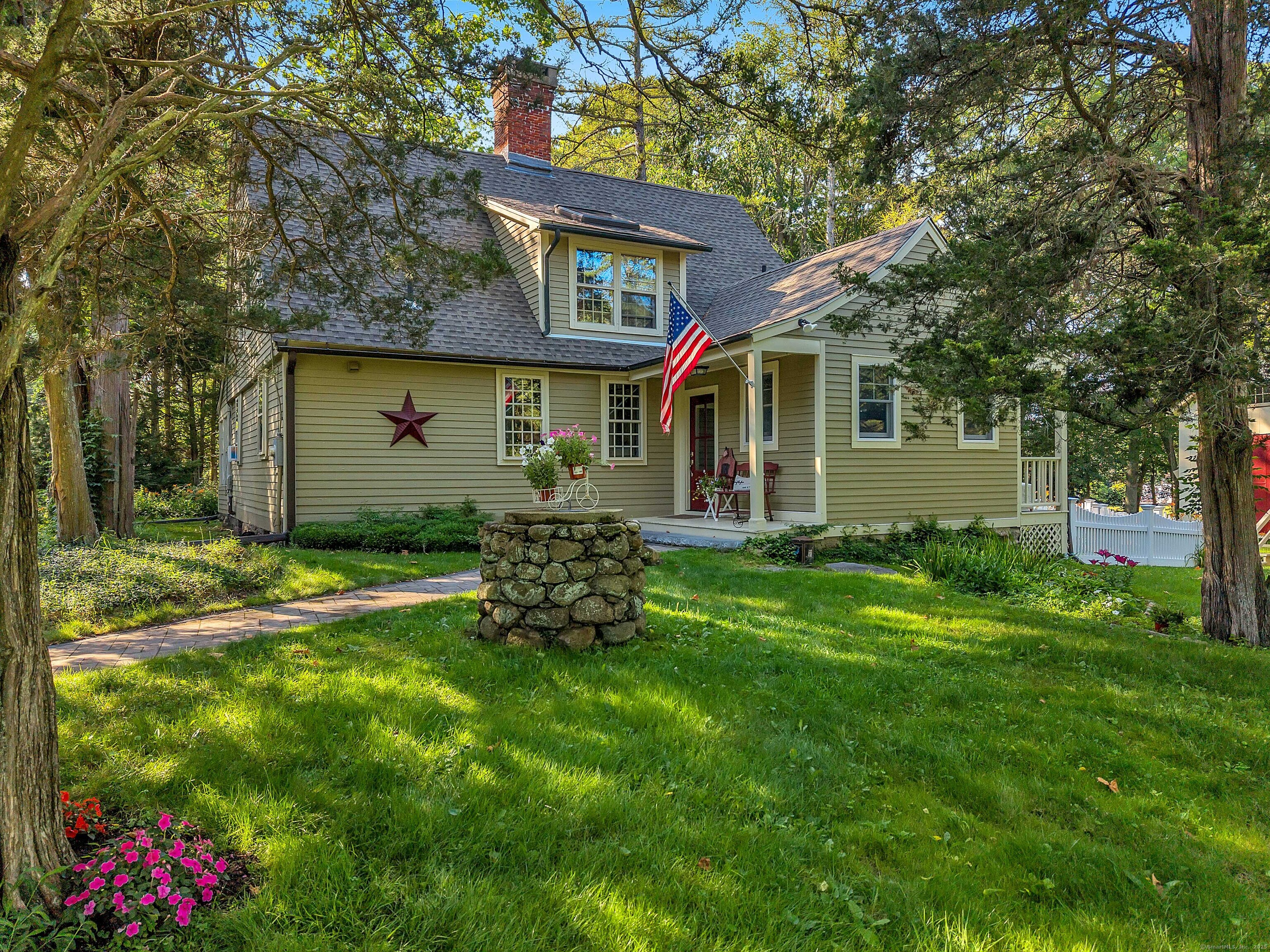 448 Grove Beach Road North Westbrook, CT 06498 - Photo 10 of 40 a front view of house with yard and green space