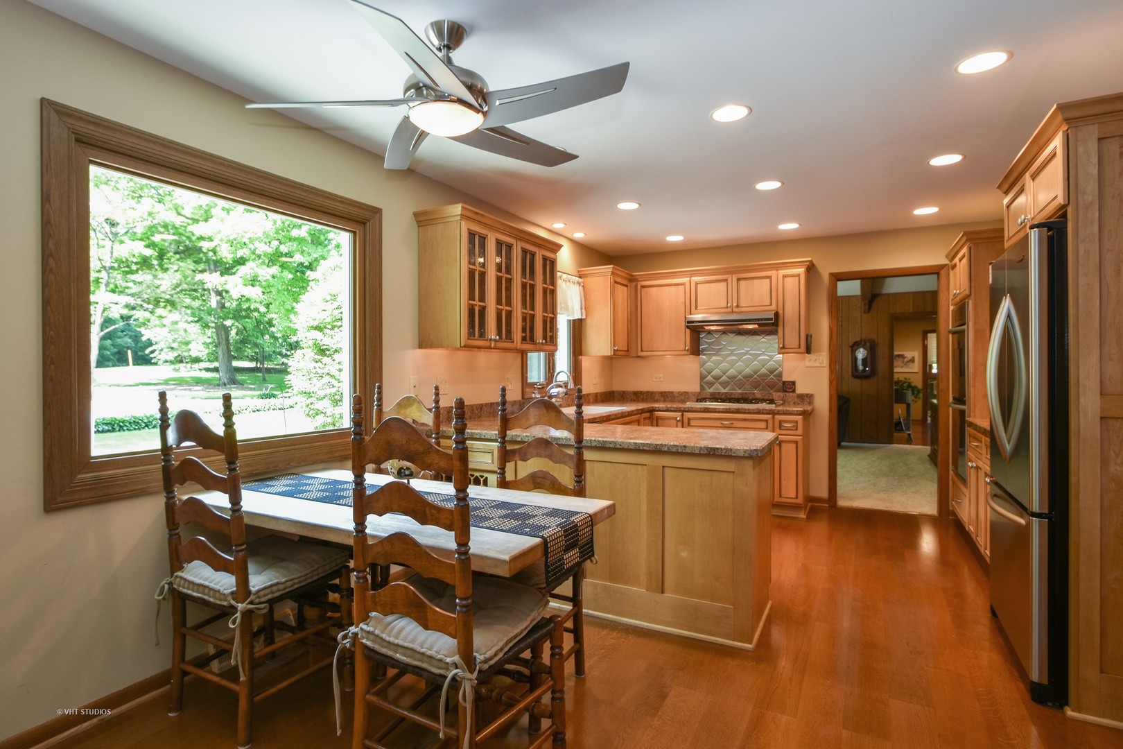 570 Aberdeen Road Frankfort, IL 60423 - Photo 7 of 20 a view of a dining room with furniture window and wooden floor