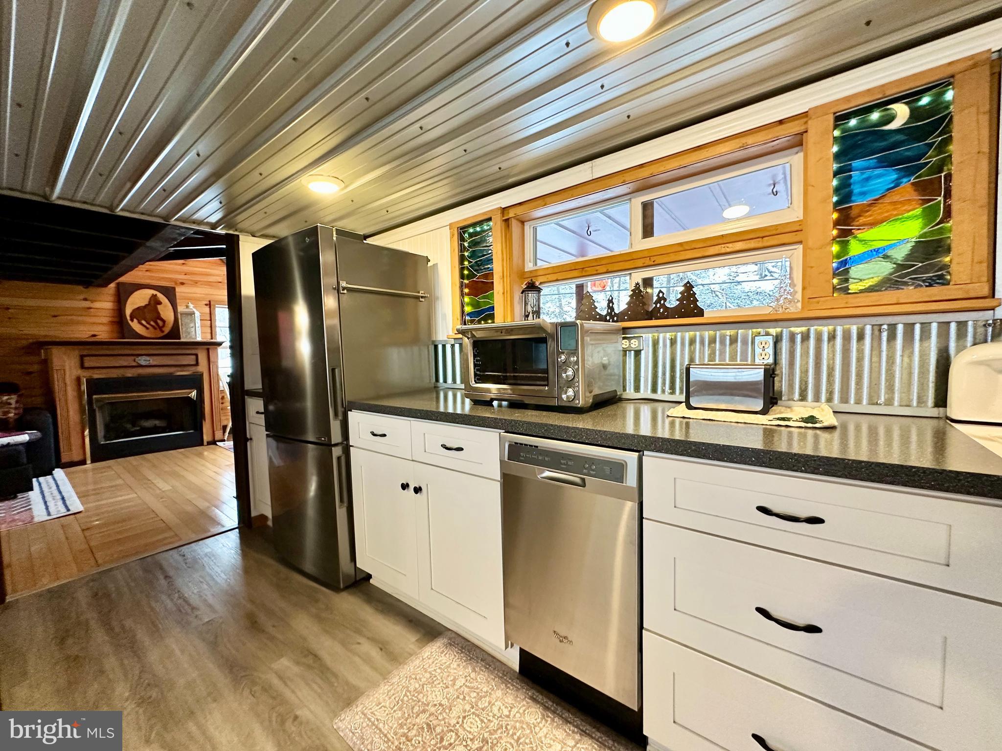 674 Bull Run Road Wrightsville, PA 17368 - Photo 13 of 62 a kitchen with stainless steel appliances granite countertop a refrigerator and a stove
