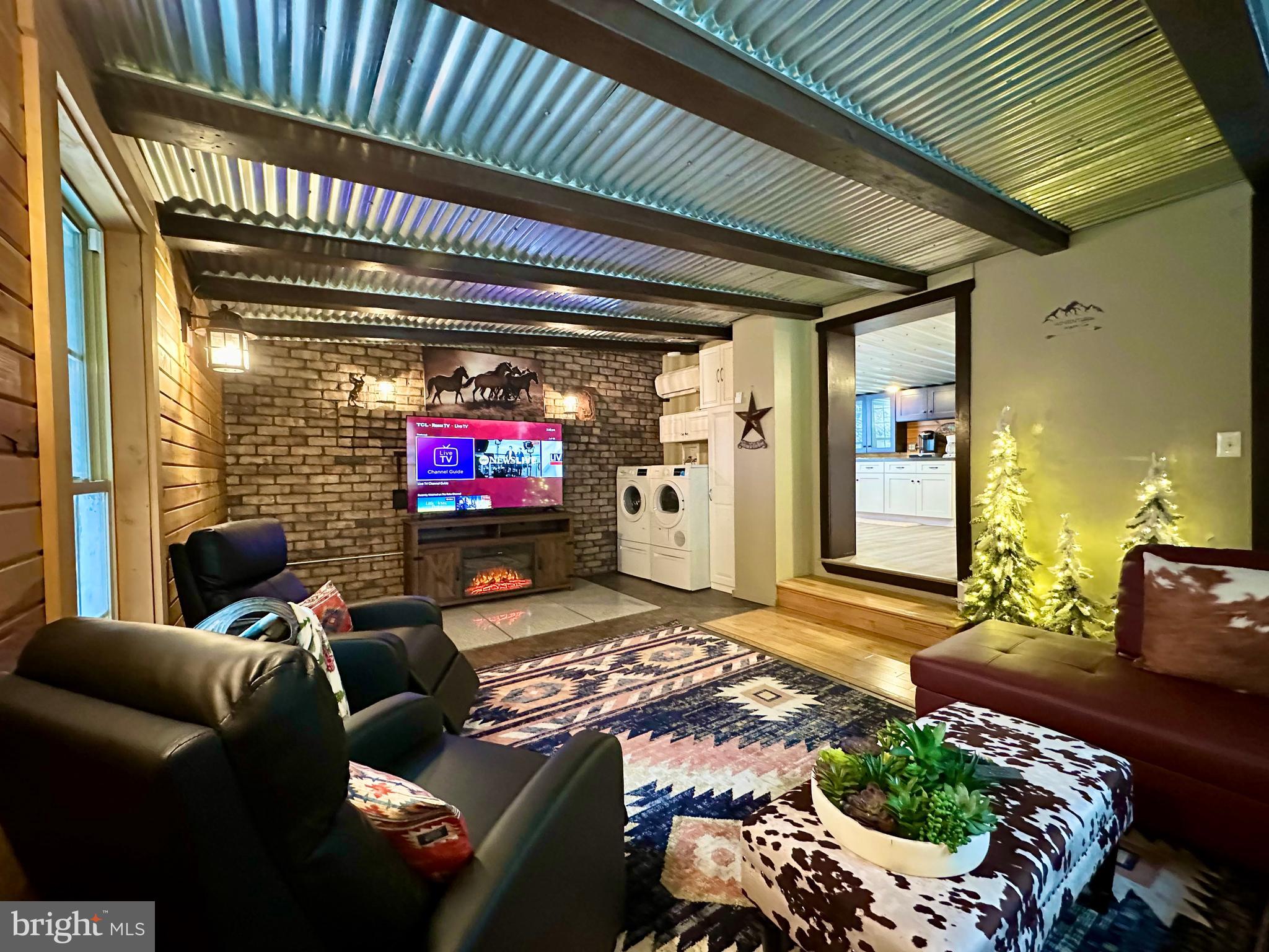 674 Bull Run Road Wrightsville, PA 17368 - Photo 16 of 62 a living room with furniture and a flat screen tv