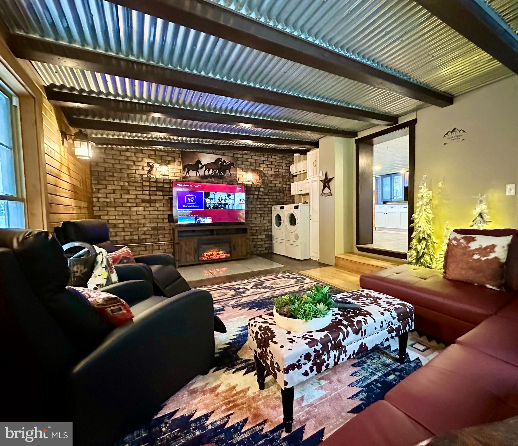 674 Bull Run Road Wrightsville, PA 17368 - Photo 17 of 62 a living room with furniture and a flat screen tv