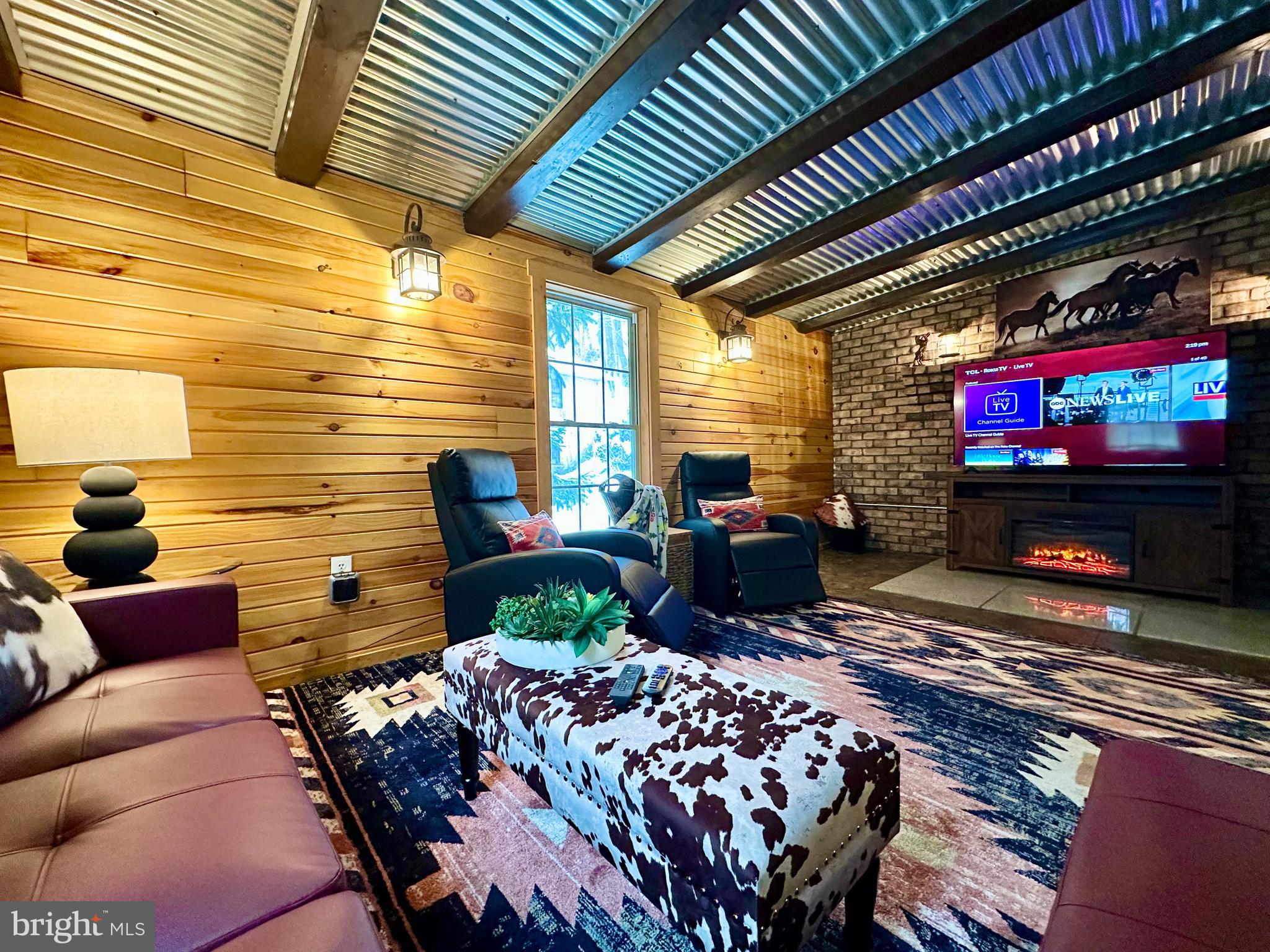 674 Bull Run Road Wrightsville, PA 17368 - Photo 18 of 62 a outdoor living space with furniture and a fireplace