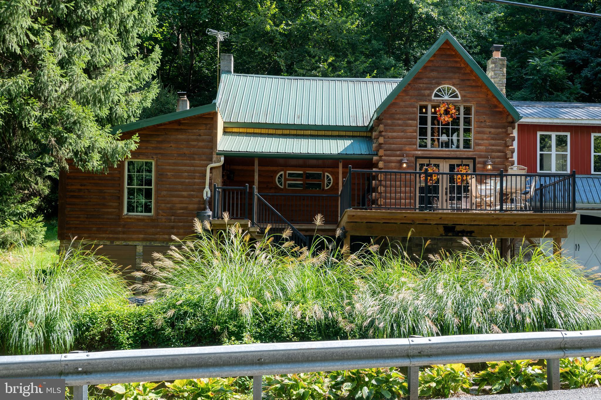 674 Bull Run Road Wrightsville, PA 17368 - Photo 2 of 62 a house view with a garden space