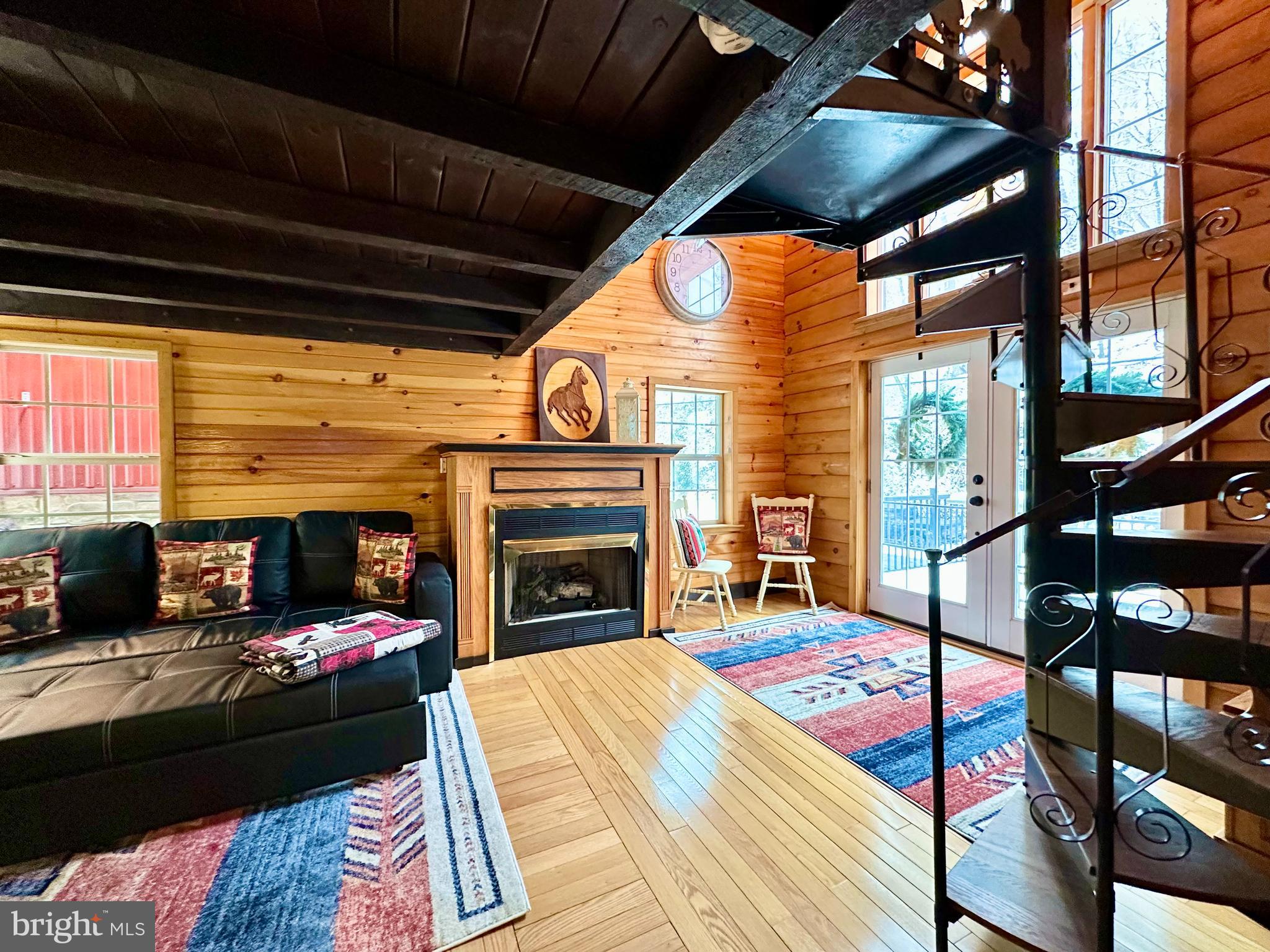 674 Bull Run Road Wrightsville, PA 17368 - Photo 21 of 62 a living room with furniture fireplace and a flat screen tv