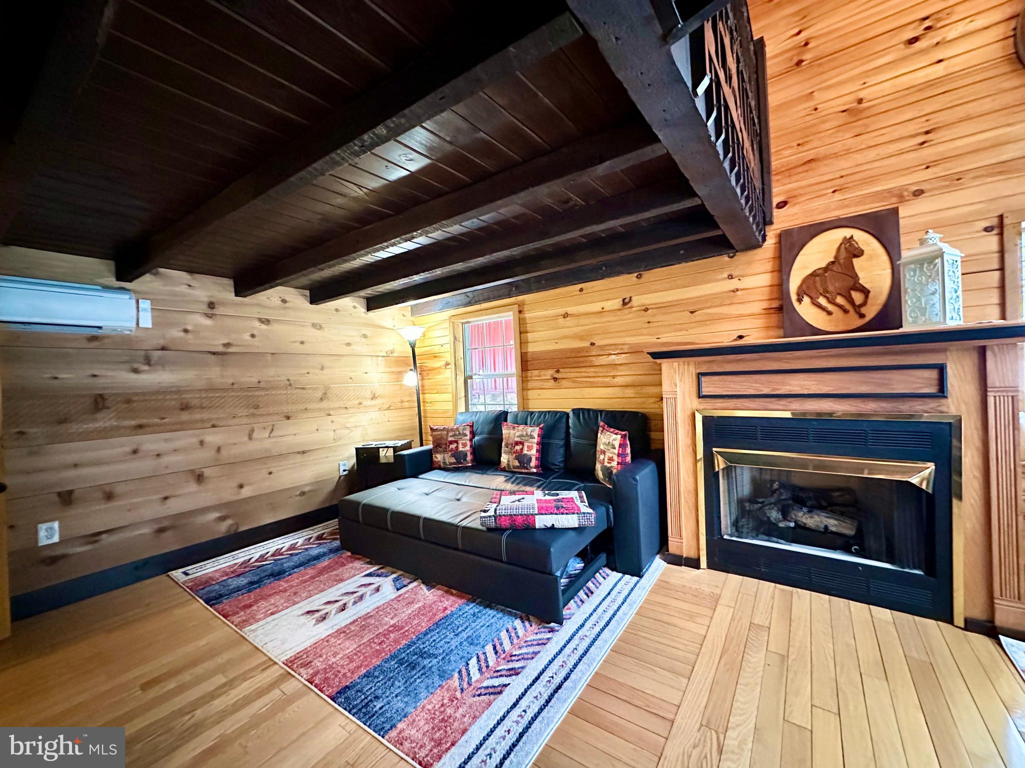 674 Bull Run Road Wrightsville, PA 17368 - Photo 22 of 62 a bedroom with a bed and a fireplace