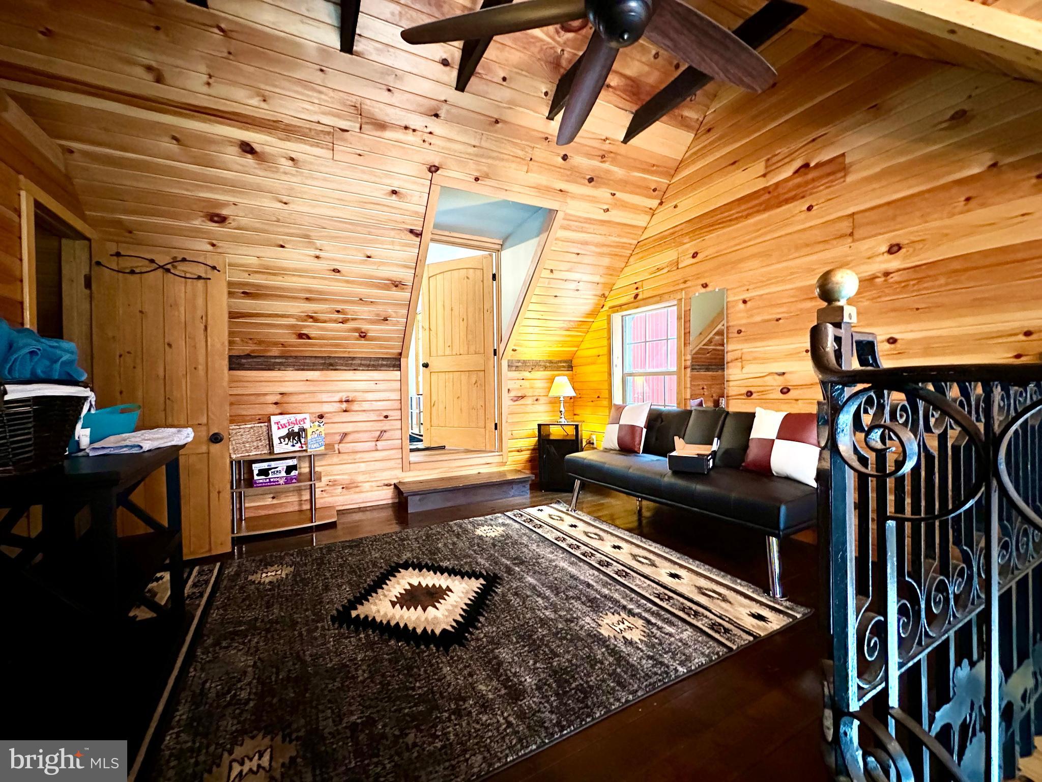 674 Bull Run Road Wrightsville, PA 17368 - Photo 30 of 62 a living room with furniture and a wooden floor