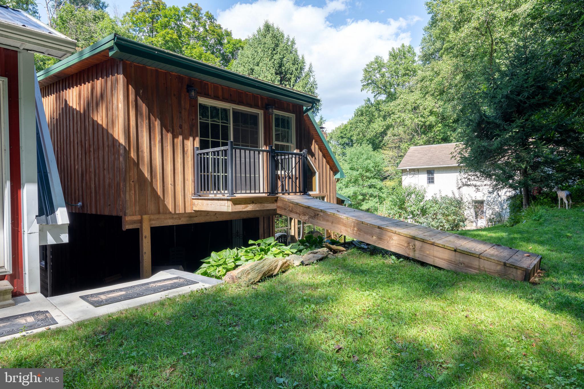 674 Bull Run Road Wrightsville, PA 17368 - Photo 50 of 62 a view of a house with a yard and a large tree
